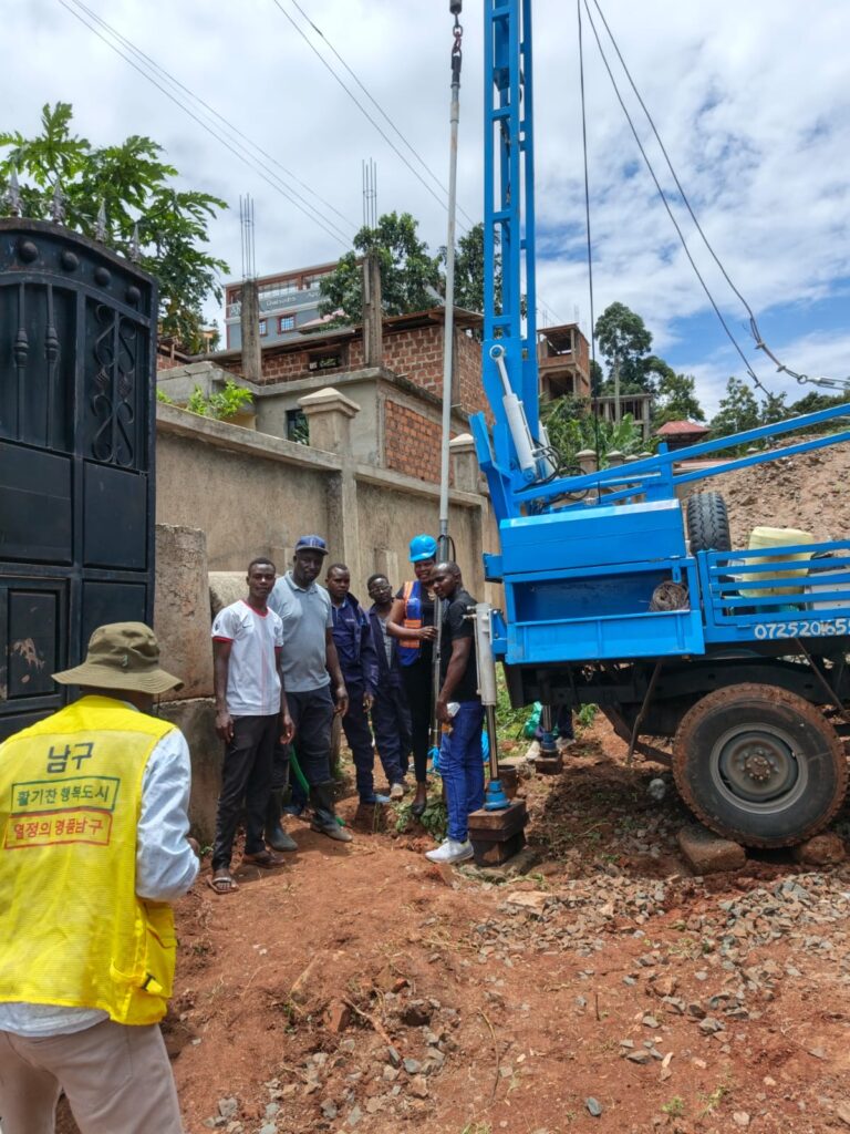Construction crew and machinery carrying out site work in Kenya — Fusion John Construction